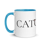 Side view of Catology mug with blue handle on white background